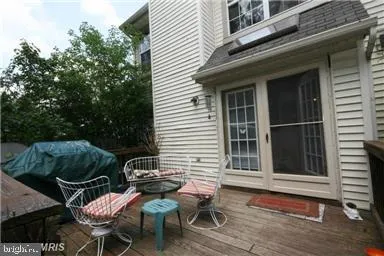 a backyard of a house with seating space