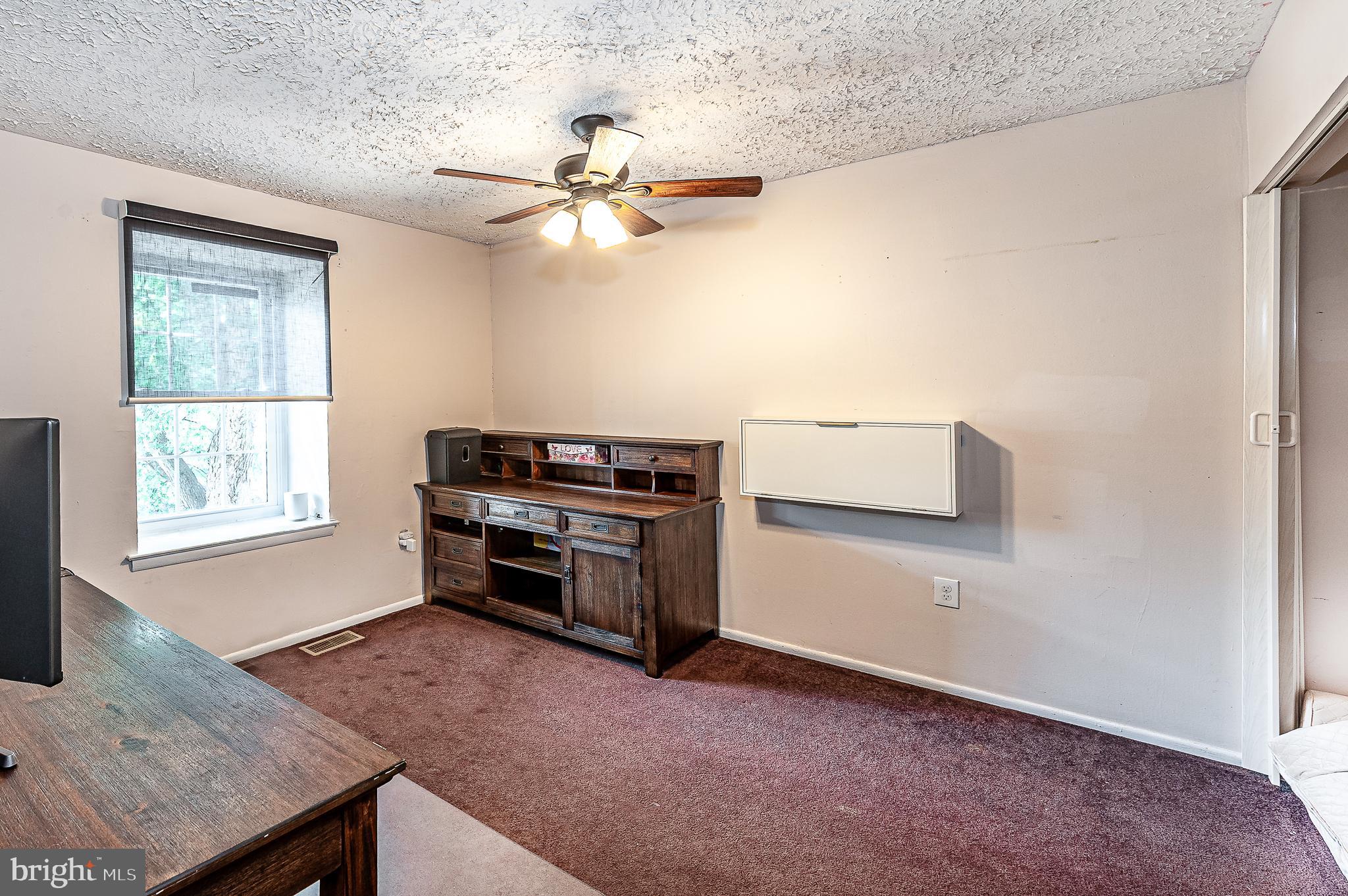 41 Noble Road Sicklerville, NJ 08081 - Photo 13 of 18 a living room with furniture and a window