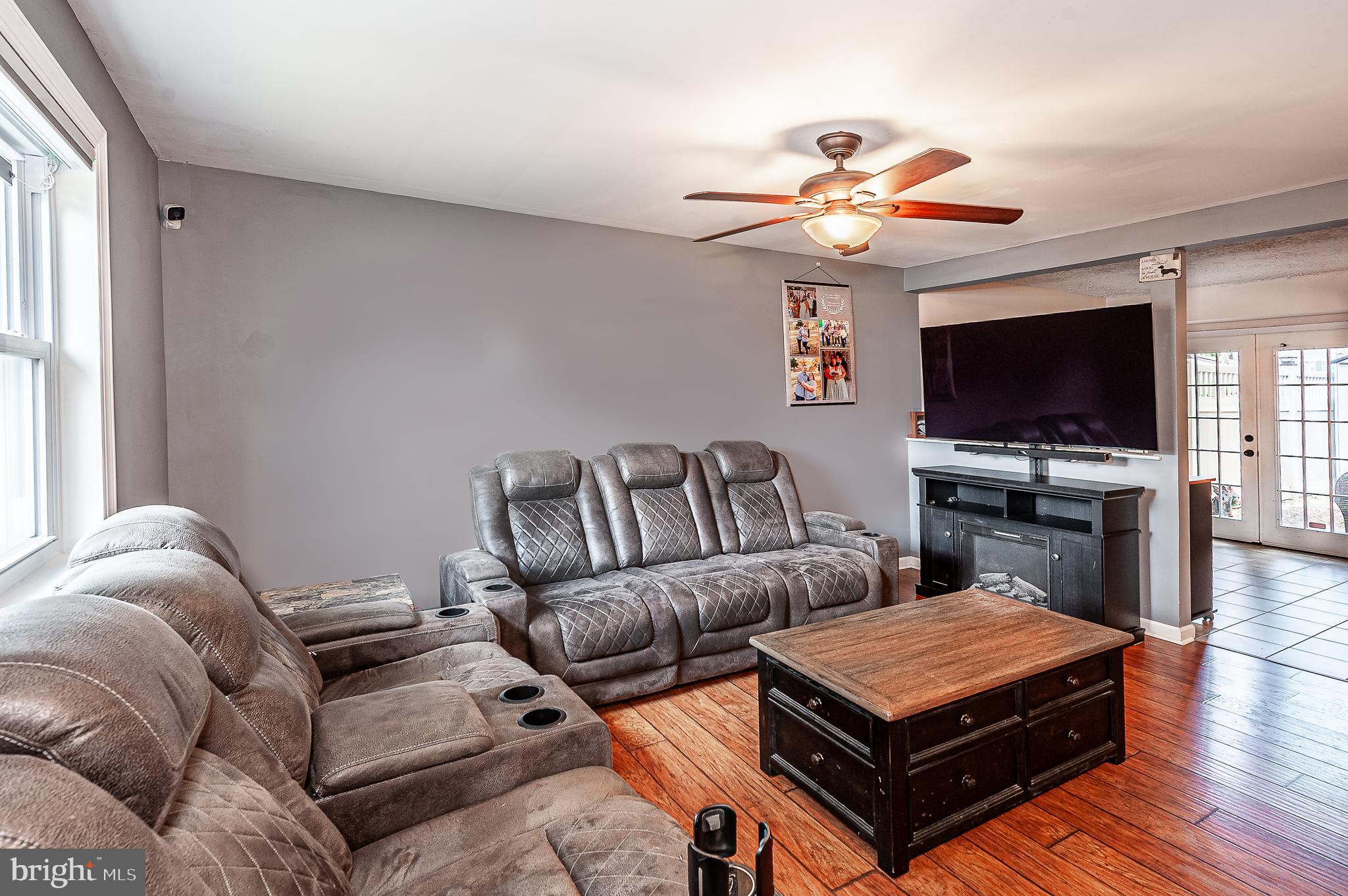 41 Noble Road Sicklerville, NJ 08081 - Photo 2 of 18 a living room with furniture and a flat screen tv