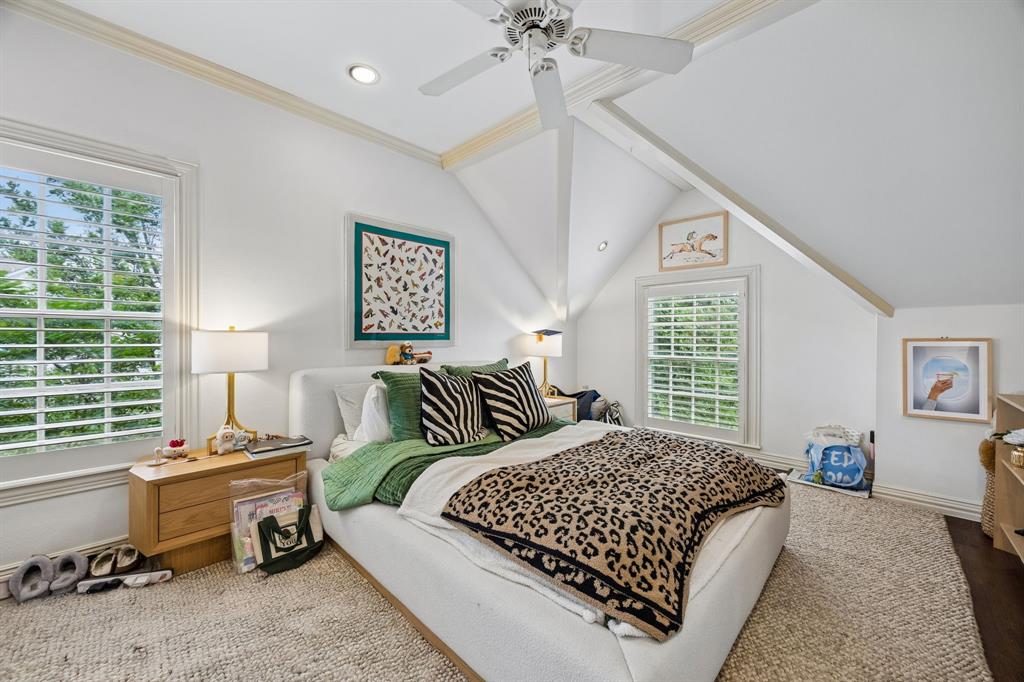 3101 Rosedale Avenue, Unit D University Park, TX 75205 - Photo 13 of 23 a bedroom with a bed and a window