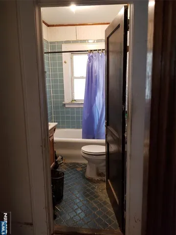 a view of hallway with stairs