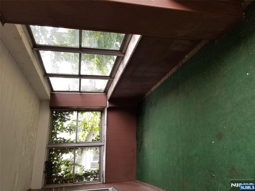 734 Broad Street Bloomfield, NJ 07003 - Photo 2 of 23 a view of an empty room with a window