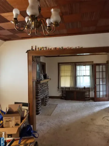 a kitchen with stainless steel appliances a sink stove and microwave