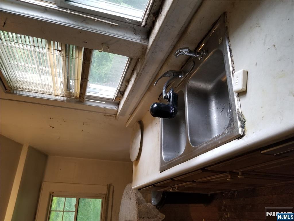 734 Broad Street Bloomfield, NJ 07003 - Photo 10 of 23 a close view of sink and tap