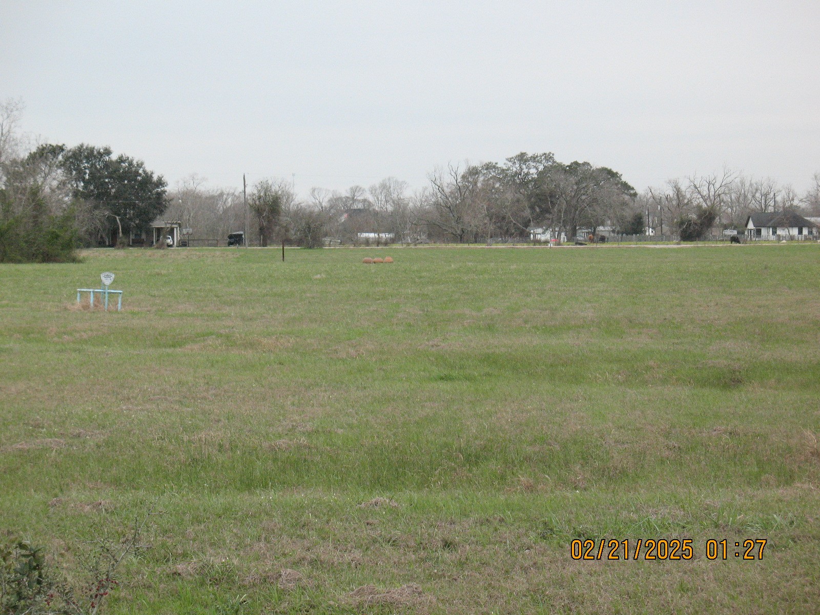 23110 FM 521 Road Angleton, TX 77515 - Photo 6 of 9 a view of a field with trees in the background