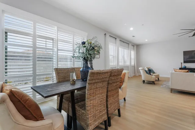a workspace with furniture and a potted plant