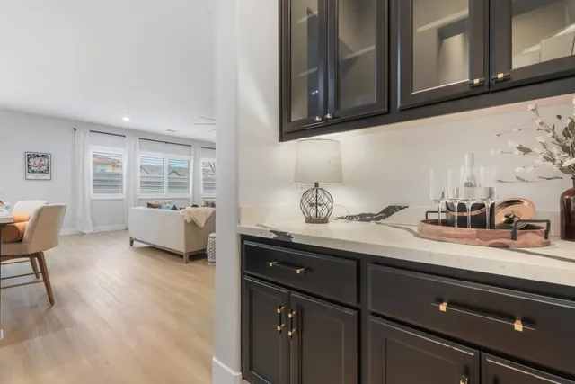 a kitchen with a sink cabinets and window