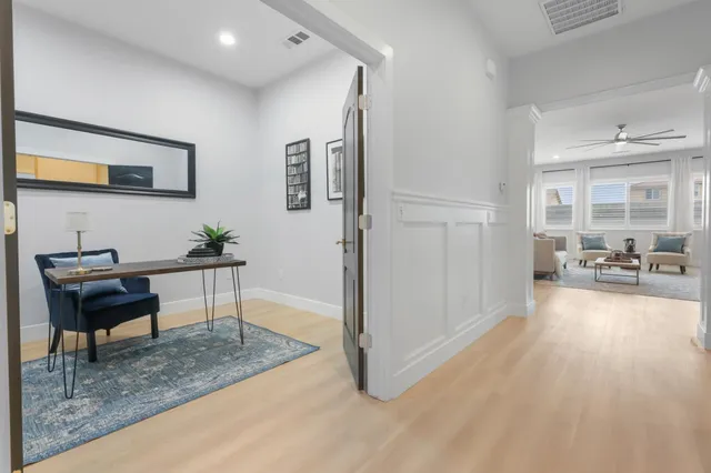 a view of a livingroom with furniture and a livingroom