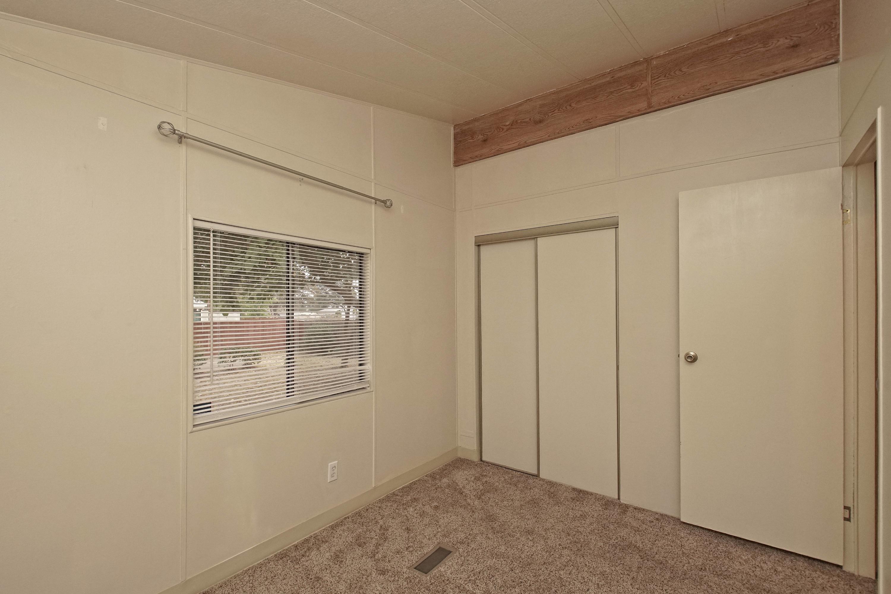 11831 Scott Road Redding, CA 96003 - Photo 13 of 22 a view of an empty room with a window