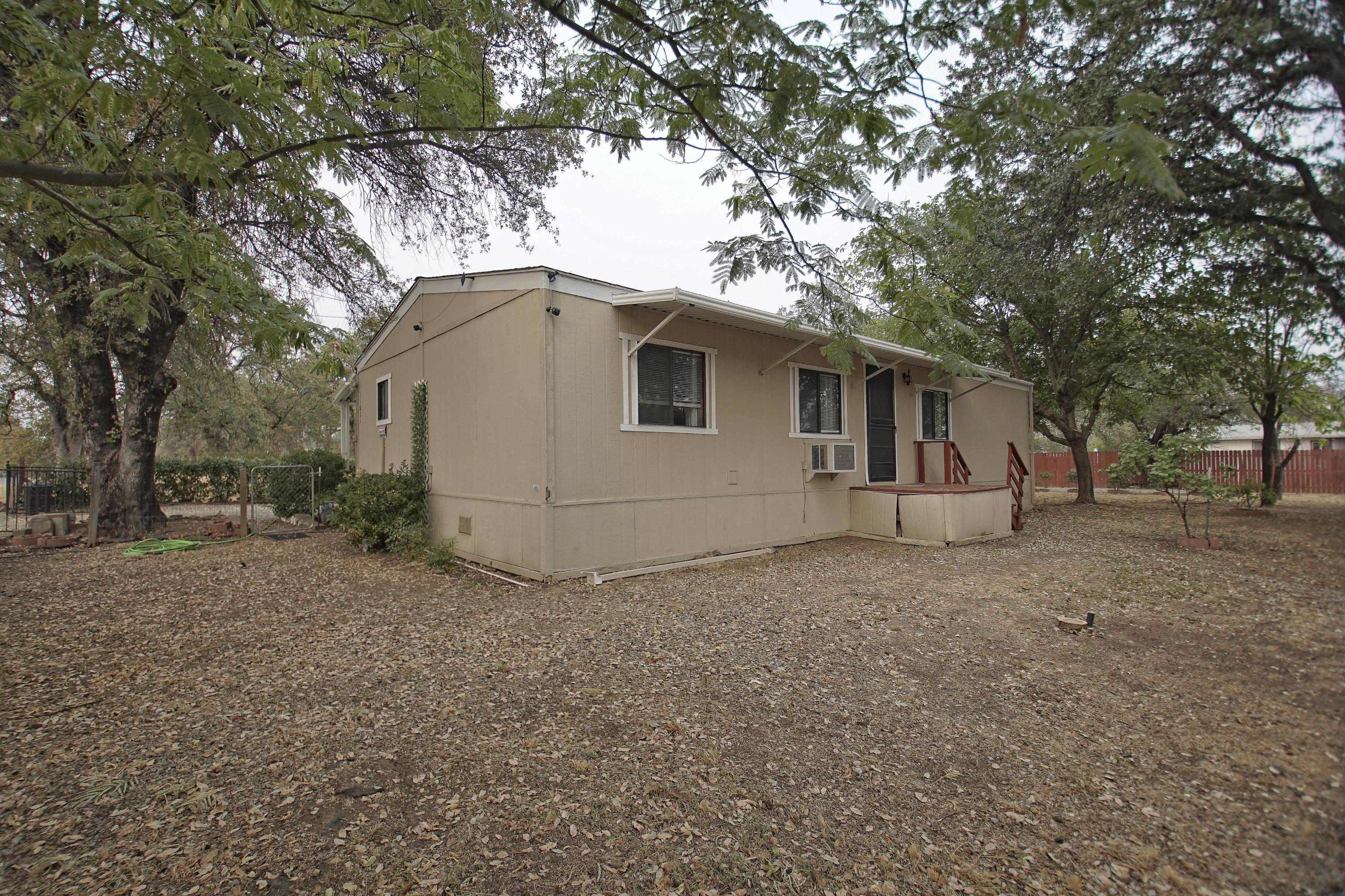 11831 Scott Road Redding, CA 96003 - Photo 22 of 22 a view of a house with a trees