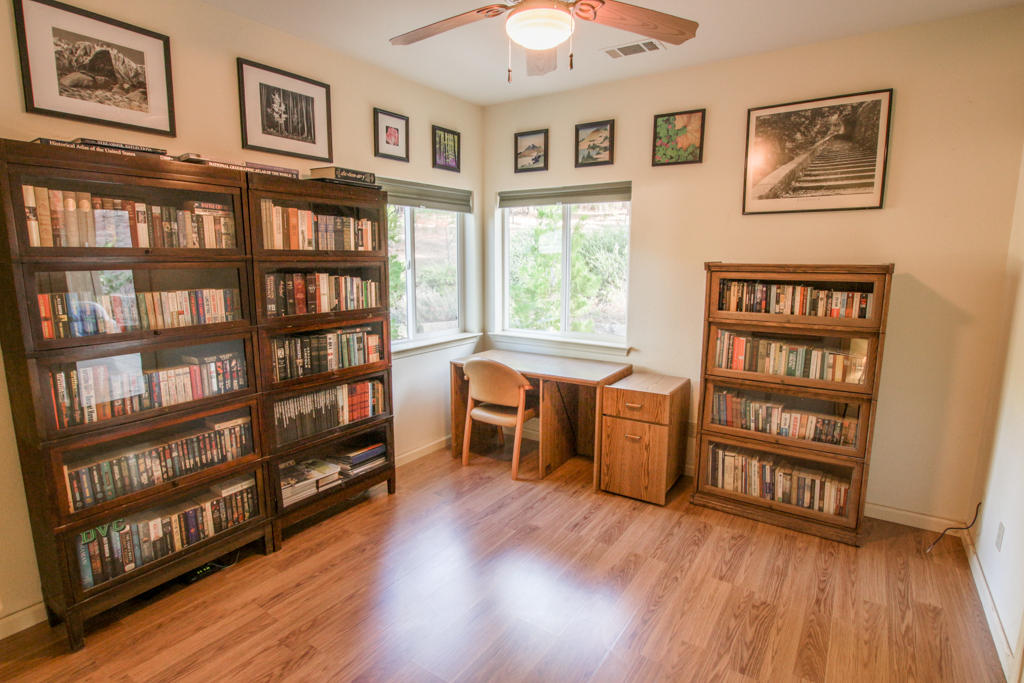 12855 Fern Road Whitmore, CA 96096 - Photo 17 of 45 a view of a livingroom with furniture and book shelf