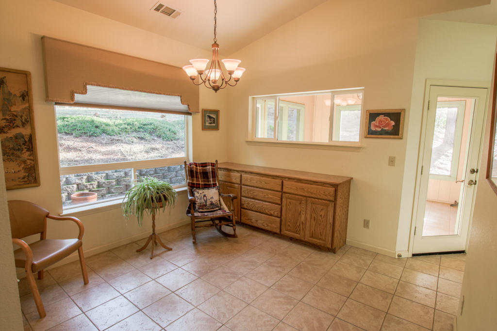12855 Fern Road Whitmore, CA 96096 - Photo 8 of 45 a view of a livingroom with furniture window and outside view