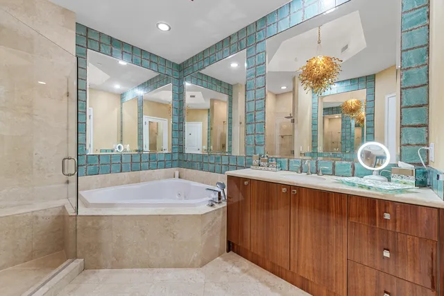 a bathroom with a bathtub and a sink