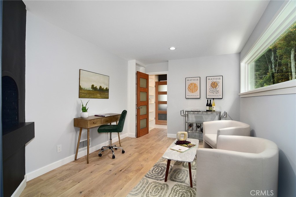 12427 Sunset Boulevard Los Angeles, CA 90049 - Photo 12 of 58 a living room with furniture and wooden floor