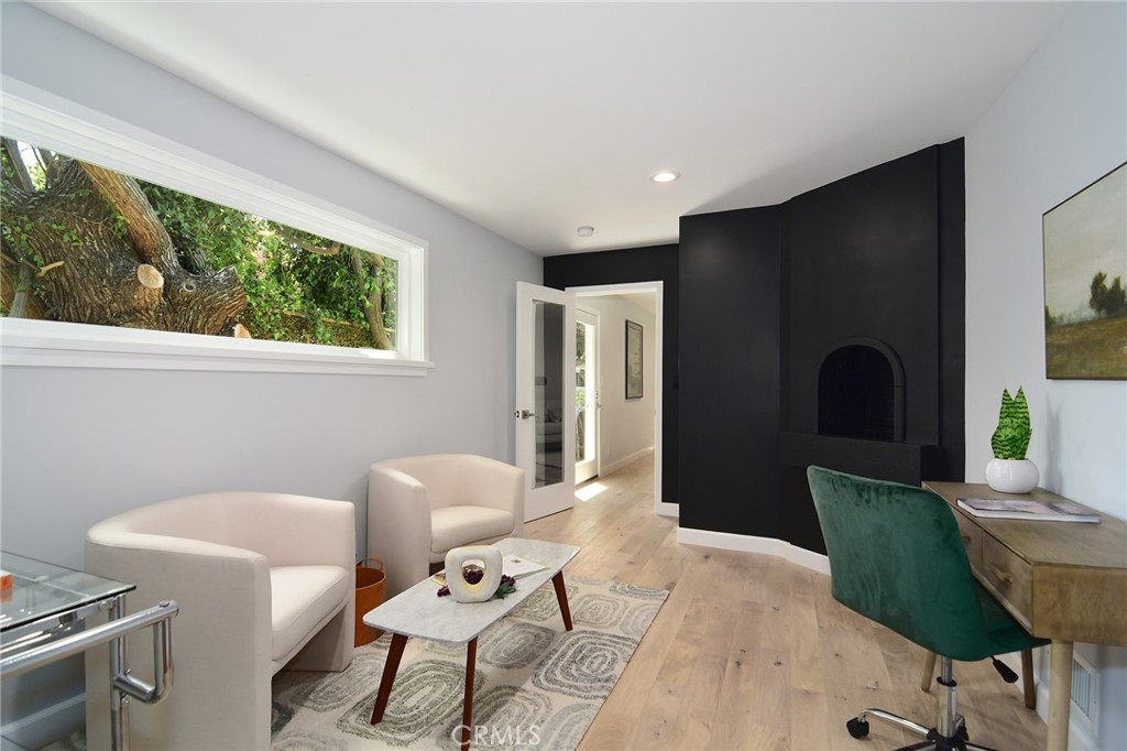12427 Sunset Boulevard Los Angeles, CA 90049 - Photo 13 of 58 a living room with furniture and a window