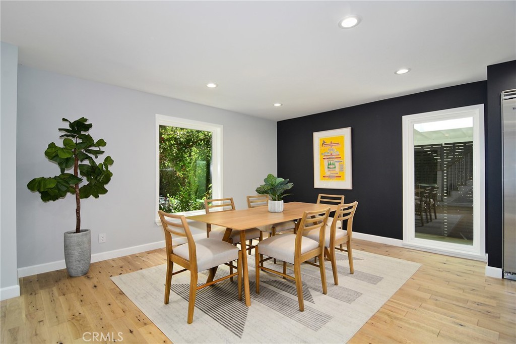 12427 Sunset Boulevard Los Angeles, CA 90049 - Photo 21 of 58 a dining room with furniture and window