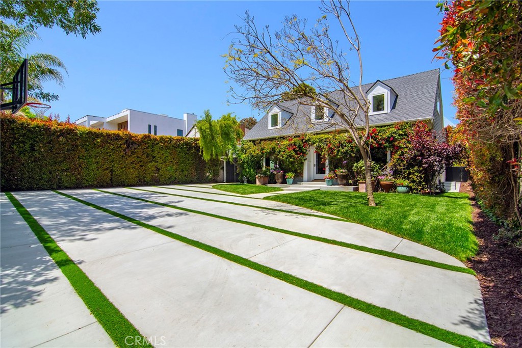 12427 Sunset Boulevard Los Angeles, CA 90049 - Photo 3 of 58 a view of a building with a yard