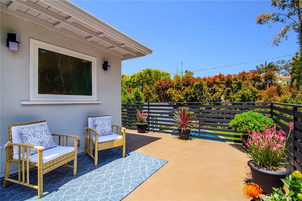 12427 Sunset Boulevard Los Angeles, CA 90049 - Photo 31 of 58 a view of a chairs and table in the patio