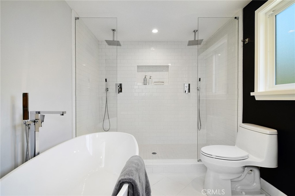 12427 Sunset Boulevard Los Angeles, CA 90049 - Photo 36 of 58 a bathroom with a sink toilet and shower