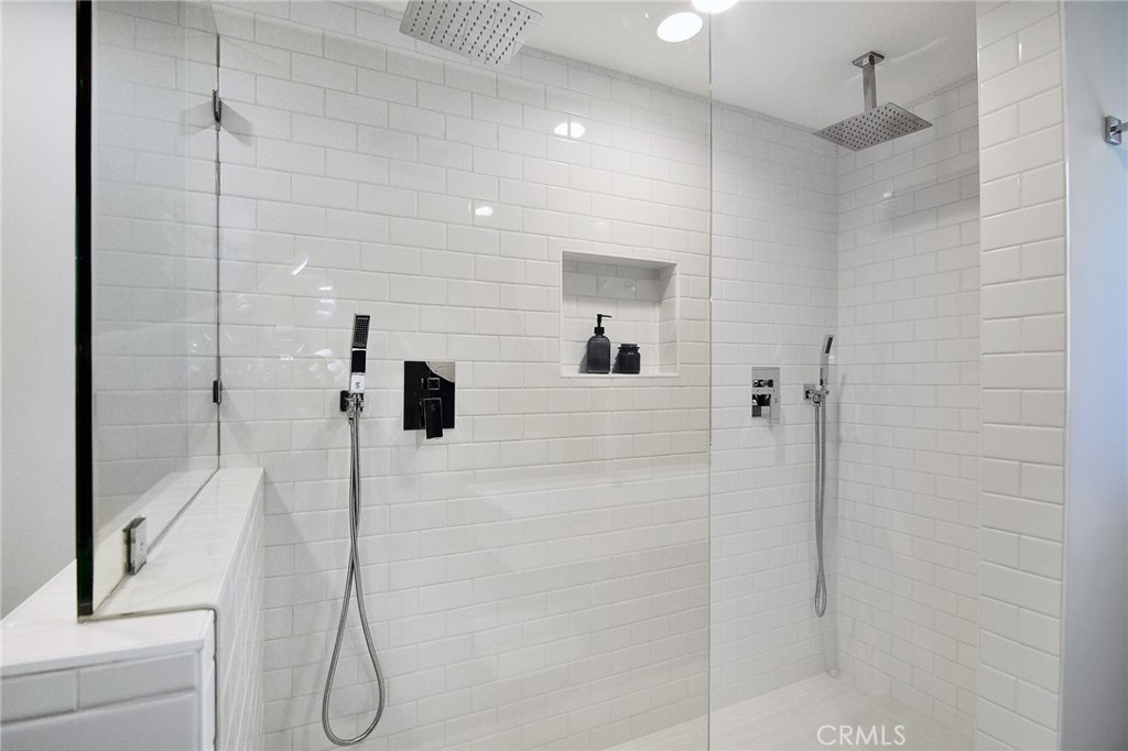 12427 Sunset Boulevard Los Angeles, CA 90049 - Photo 40 of 58 a bathroom with a shower