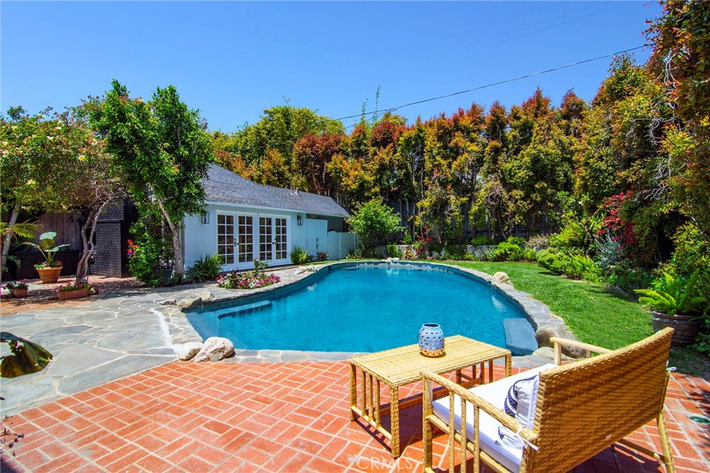 12427 Sunset Boulevard Los Angeles, CA 90049 - Photo 42 of 58 a view of swimming pool with lounge chair