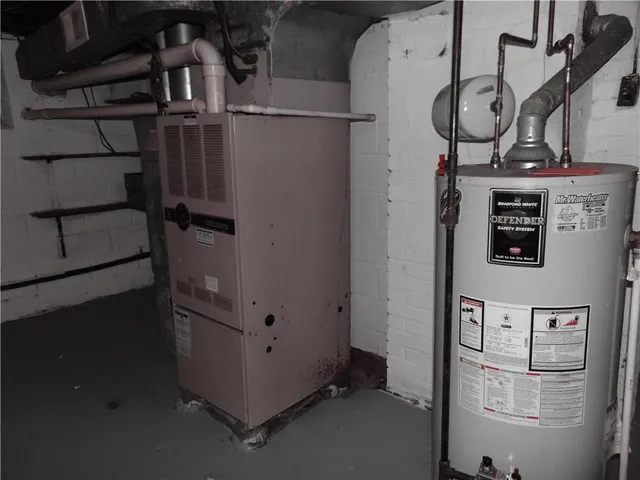 a view of storage and utility room with racks on the wall