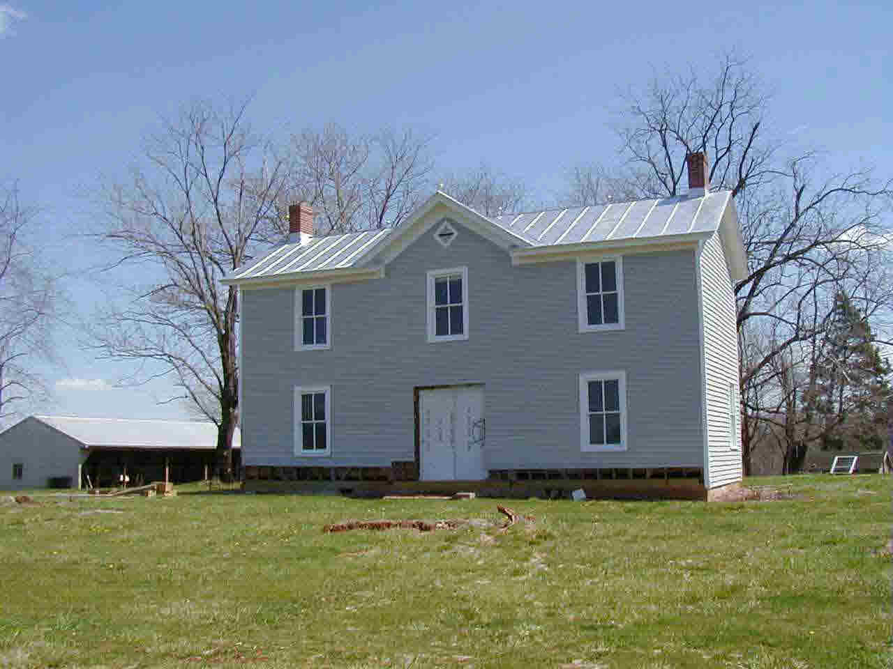 a house view with a garden space