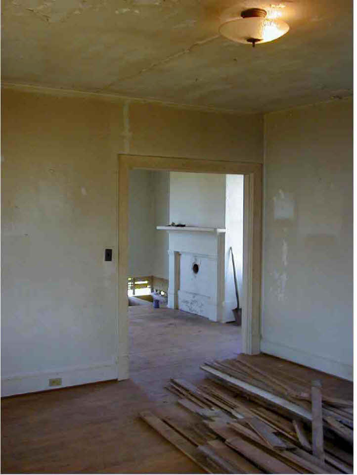 231 Rte Rochelle Va 22738 Rochelle, VA 22738 - Photo 2 of 4 a bedroom with a bed and a chandelier