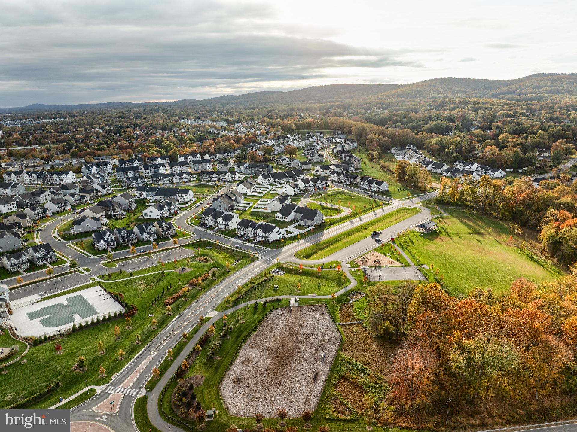 2600 Kellerton Avenue, Unit DEVONSHIRE Frederick, MD 21702 - Photo 82 of 86 an aerial view of residential houses with outdoor space