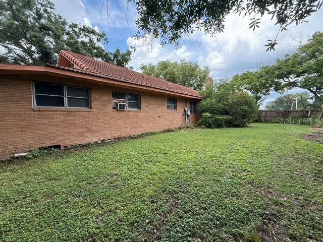 3011 South Wiggins Road Plant City, FL 33566 - Photo 2 of 17 a front view of house with yard and green space