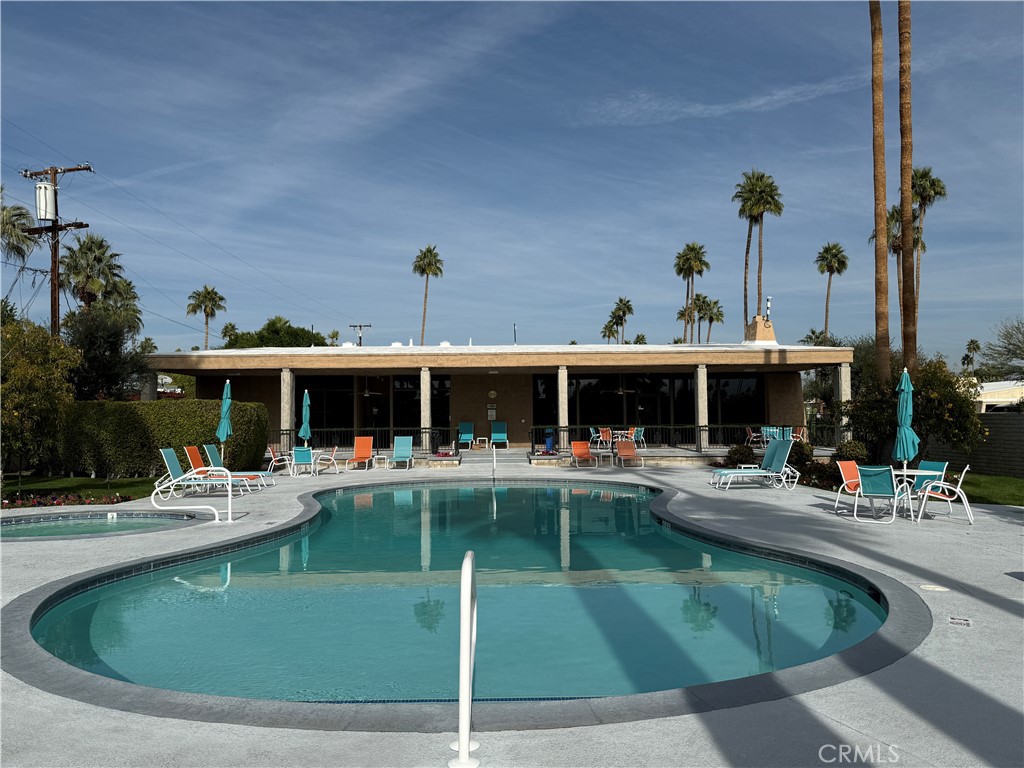 1111 East Ramon Road, Unit 51 Palm Springs, CA 92264 - Photo 26 of 28 Community Pool & Clubhouse