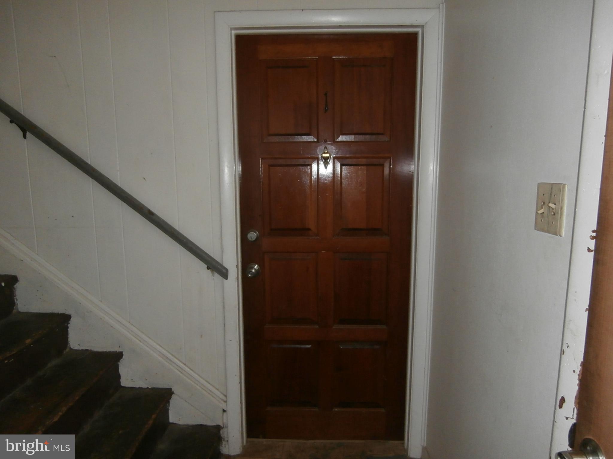 203 Cloud Street, Unit 1 Front Royal, VA 22630 - Photo 7 of 7 a view of hallway with stairs