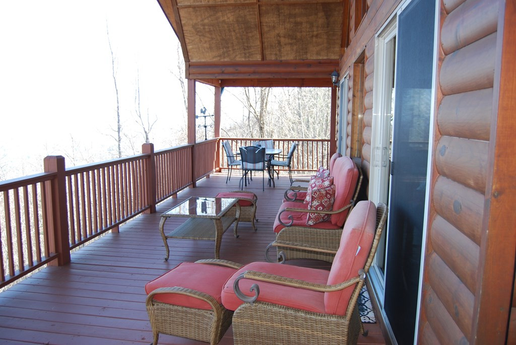 1013 Buck Ridge Drive Murphy, NC 28906 - Photo 13 of 42 Main front deck under covered roof