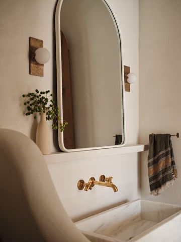 a kitchen with granite countertop a dining table and chairs