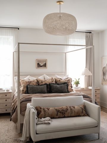 a living room with a couch and a window