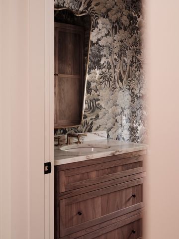 a kitchen with a sink and a window