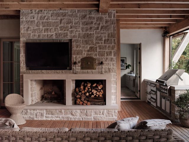 a stove top oven sitting inside of a kitchen