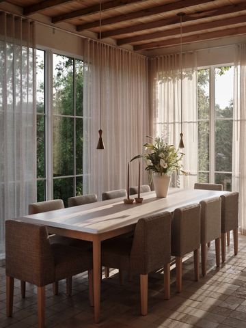 a dining room with furniture and window