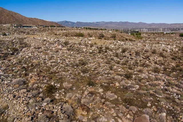 a view of a city with mountain in the background