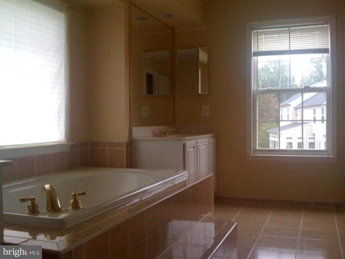8202 Rison Drive Brandywine, MD 20613 - Photo 10 of 22 Luxury Master bath w/ twin sinks & seperate shower