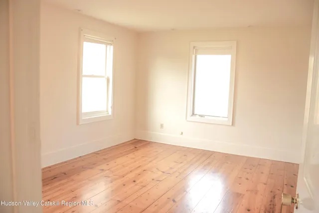 a view of a room with a window