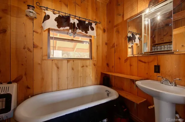 a bathroom with a sink and a bathtub