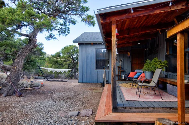 a view of house with outdoor seating space