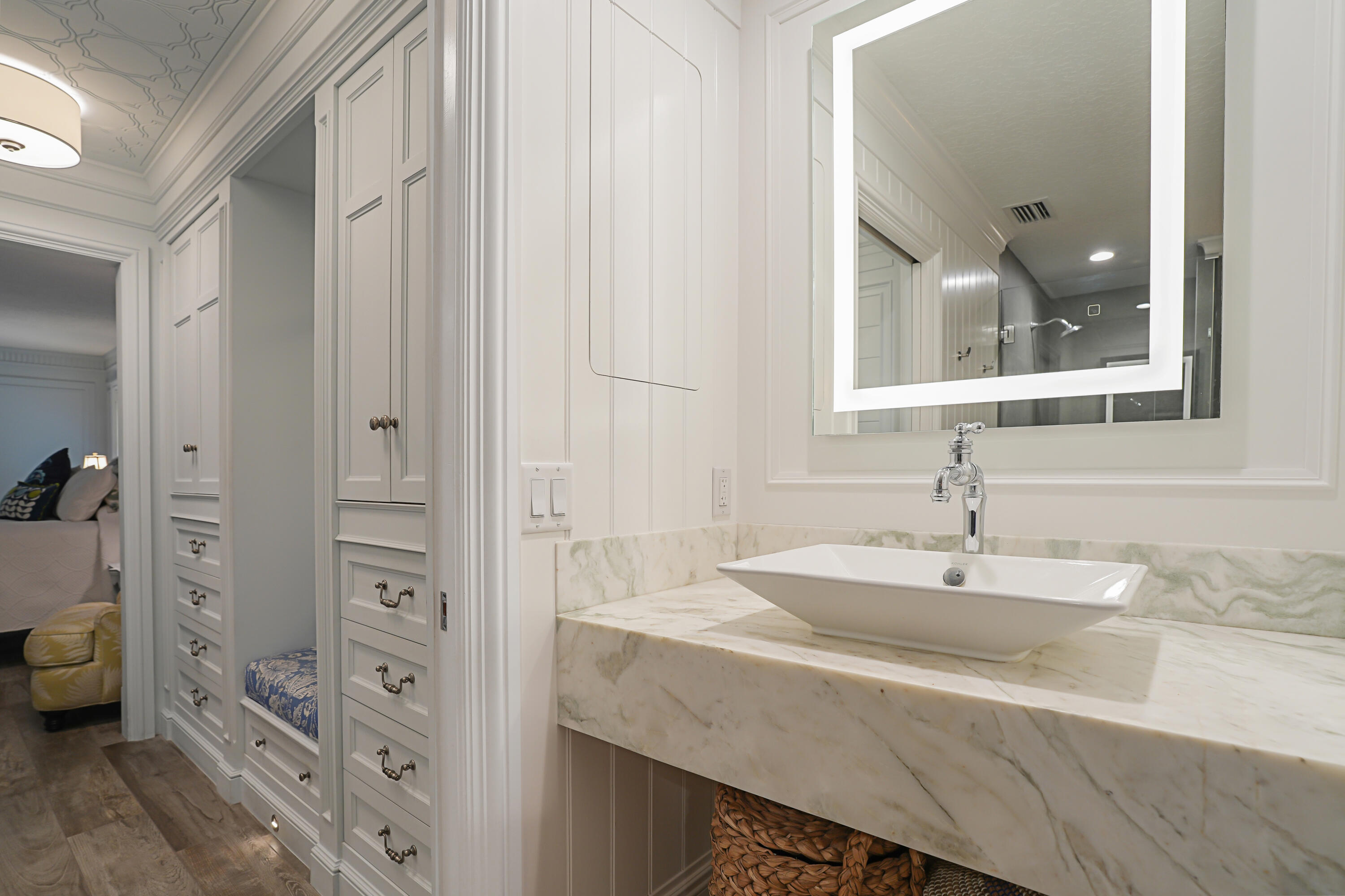 6000 Eagles Nest Drive Jupiter, FL 33458 - Photo 21 of 86 a bathroom with a sink and mirror
