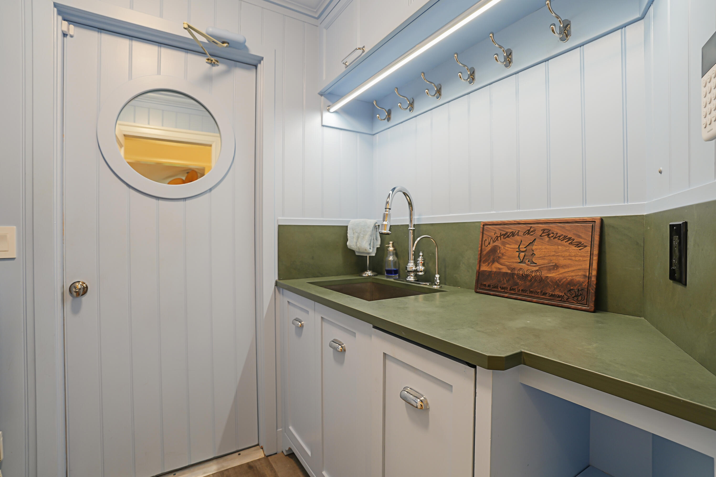 6000 Eagles Nest Drive Jupiter, FL 33458 - Photo 33 of 86 a bathroom with a sink and a mirror