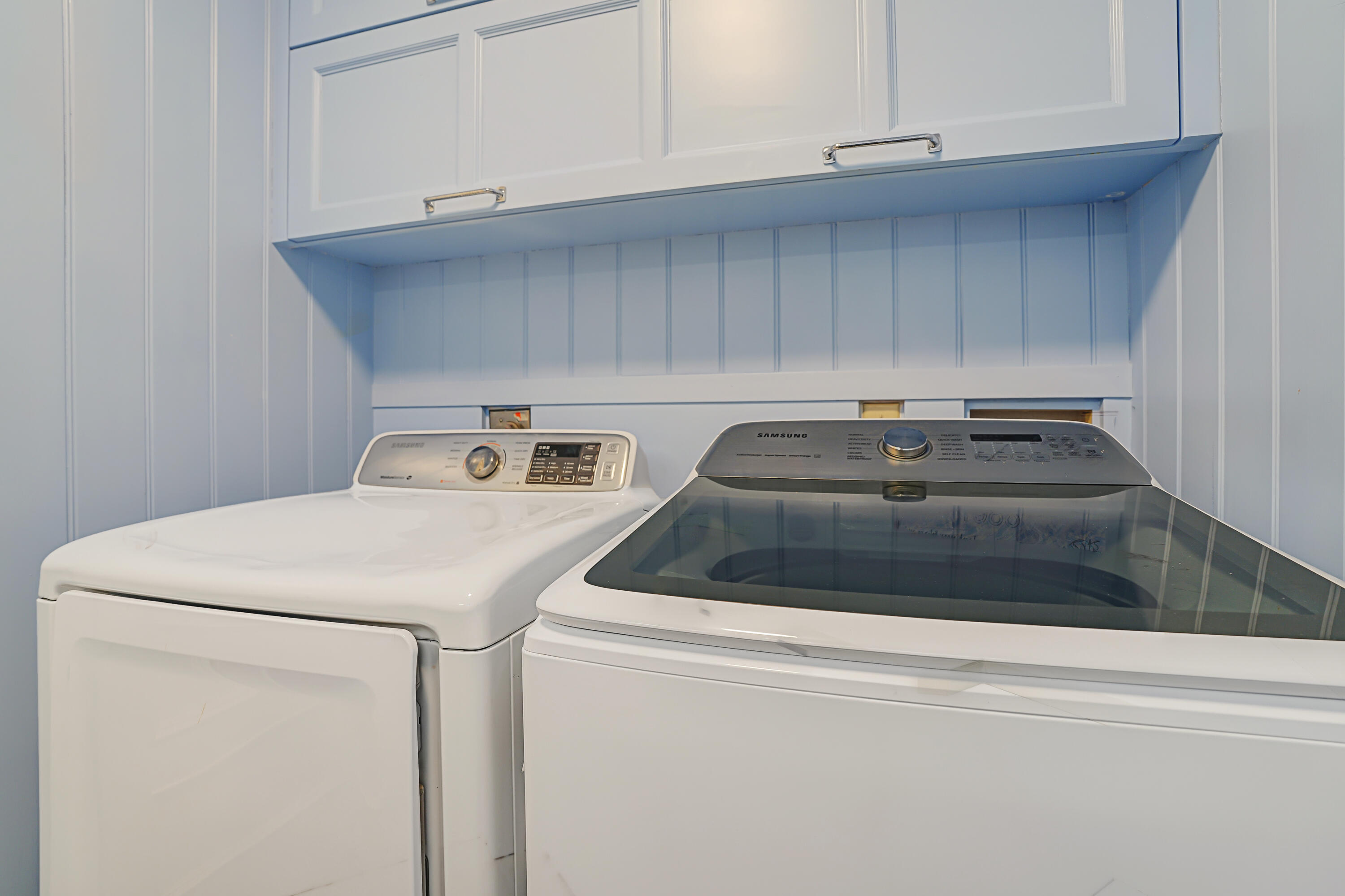 6000 Eagles Nest Drive Jupiter, FL 33458 - Photo 34 of 86 a utility room with dryer and washer