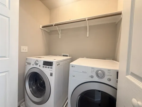 a bathroom with a toilet a sink and a mirror