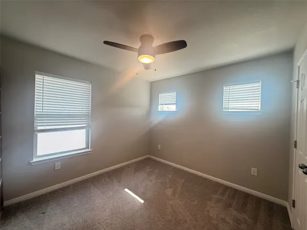 a bathroom with a sink double vanity and a mirror
