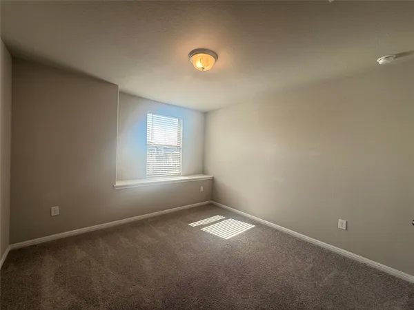 a spacious bathroom with a double vanity sink a mirror and shower