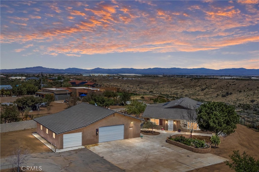 7045 Oak Hill Road Oak Hills, CA 92344 - Photo 1 of 30 Sunset over the home and workshop